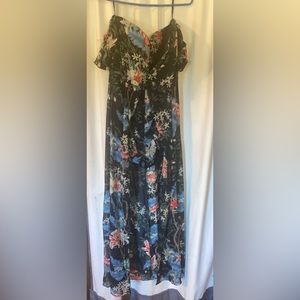 Romper style dress. Has shorts with long skirt underneath off the shoulder
